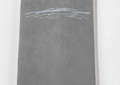 Drei Bände in Leder mit Suite libre der einzelnen Motive